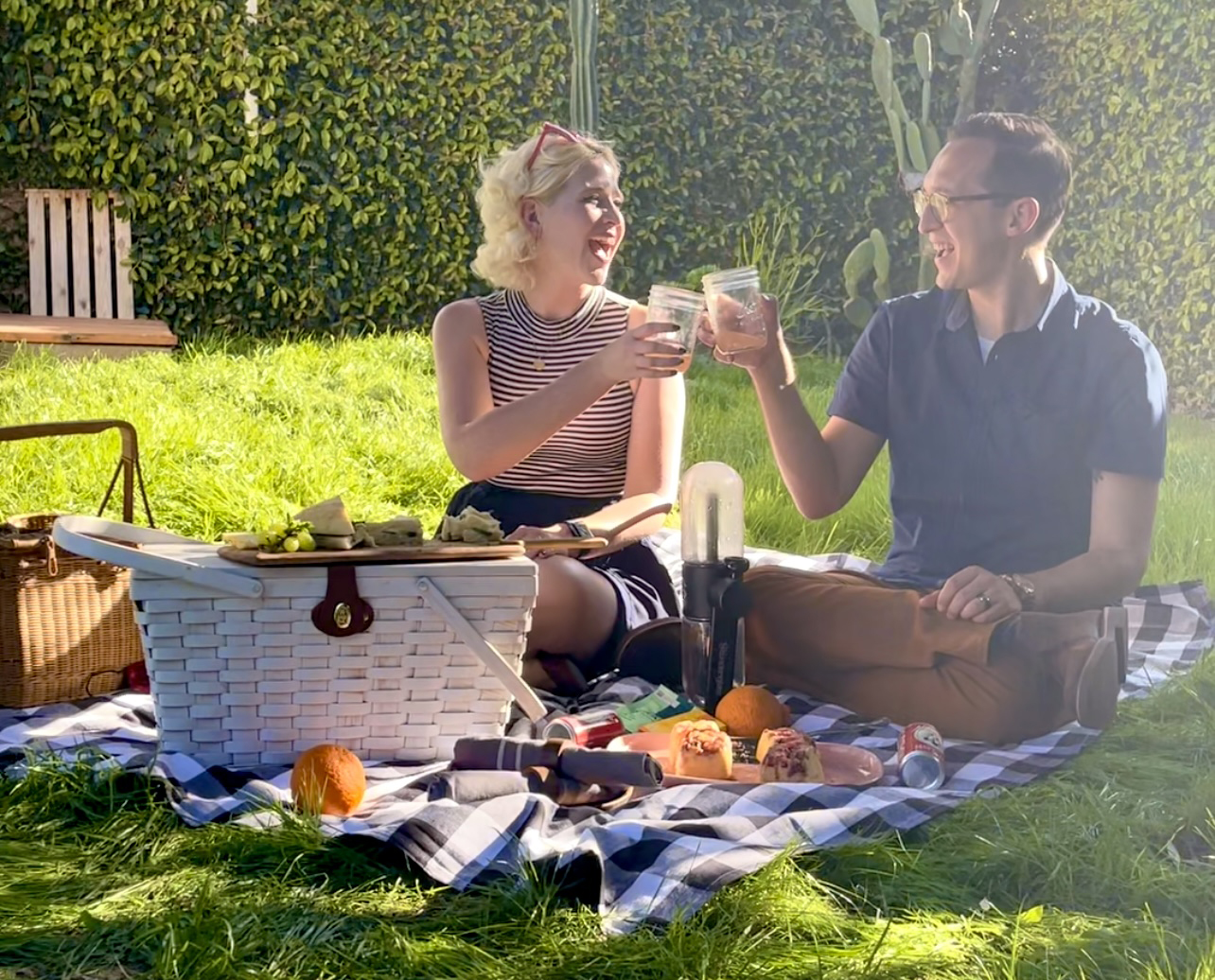 Picnic Cheers with young man and woman
