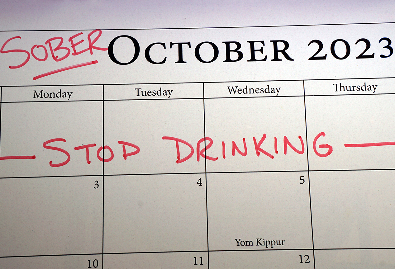 Calendar marked for Sober October, a month to stop drinking.